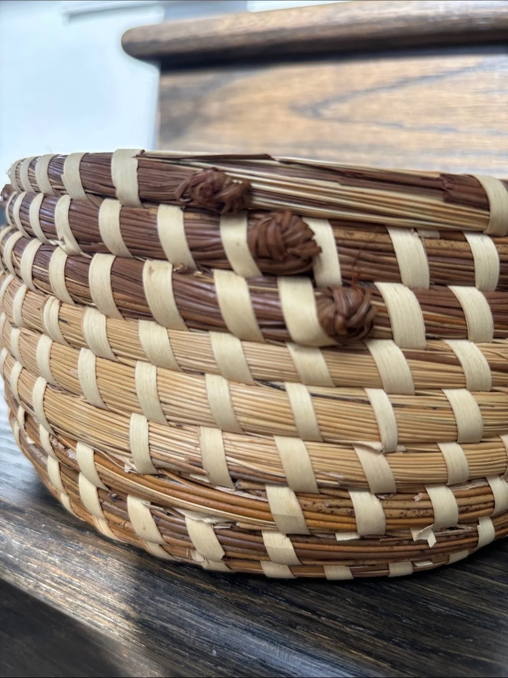 Sweetgrass handmade SC basket, round w/knots on the sides, 2 tone, 8” diameter